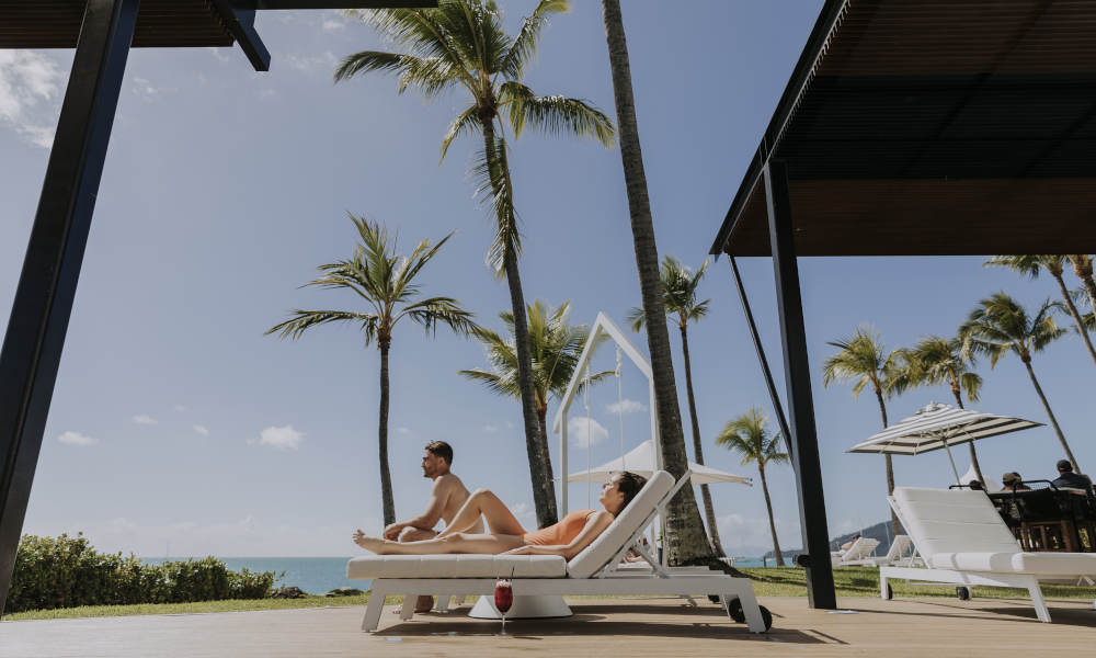 couple enjoying time by resort pool