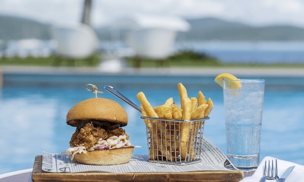 burgers and chips by the pool 