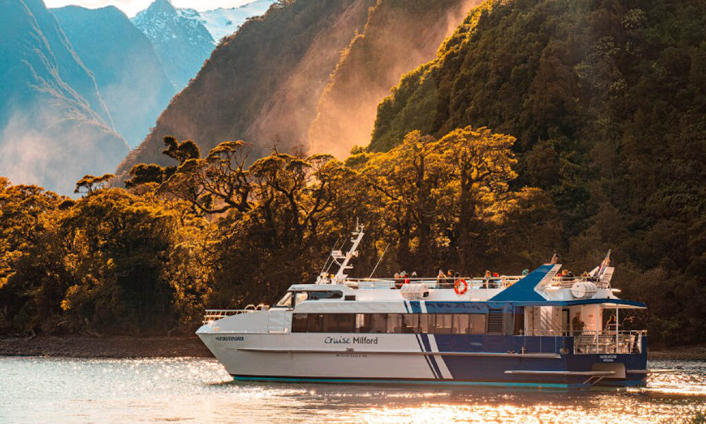 side view of boat at sunset